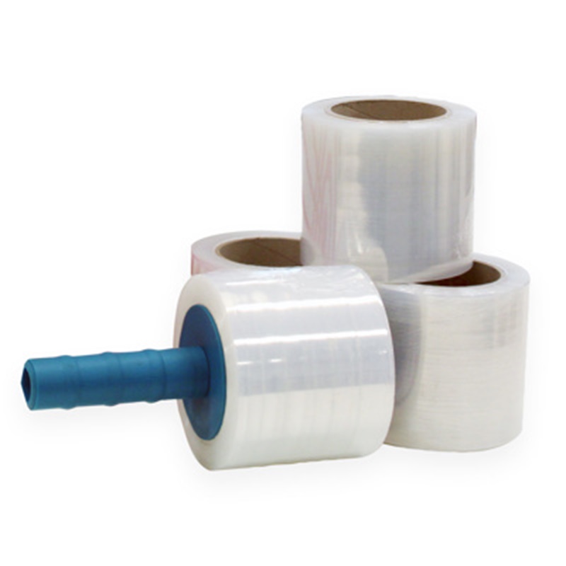 four rolls of bundling film shown with a dispenser